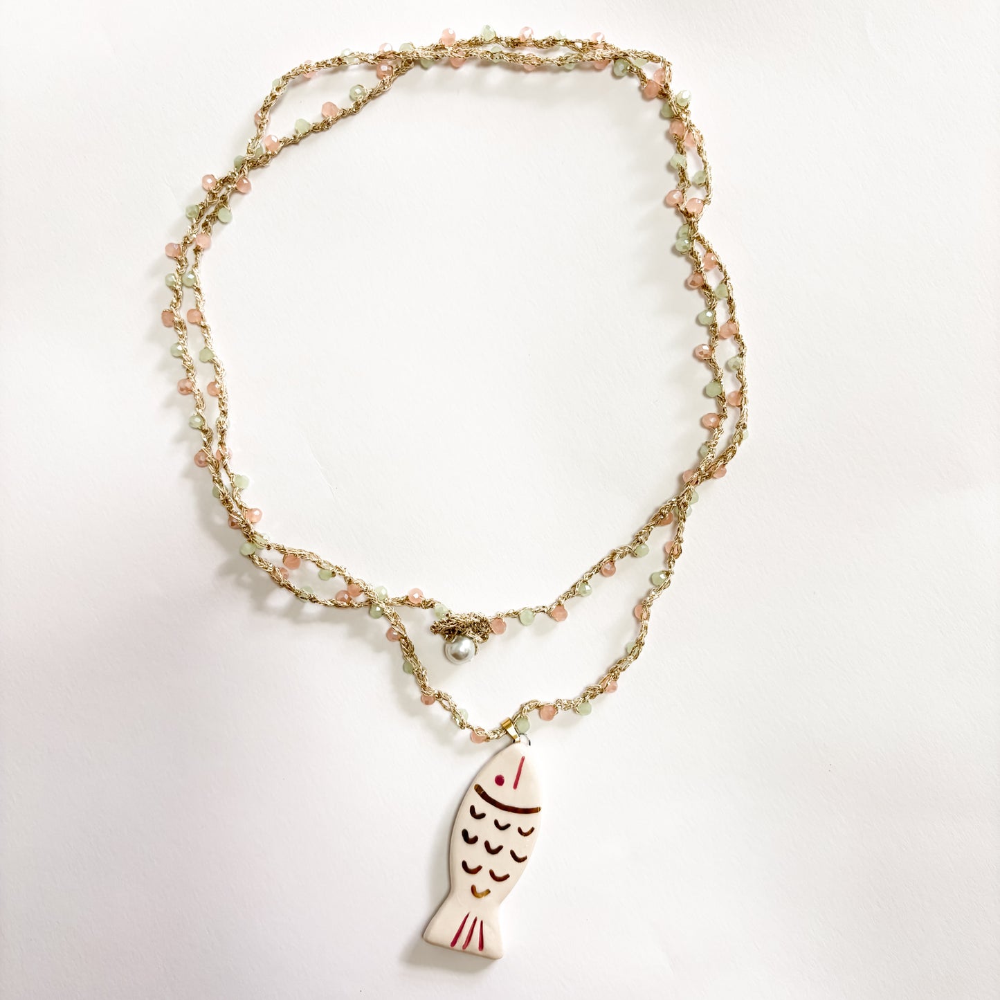 Collar pez beige
