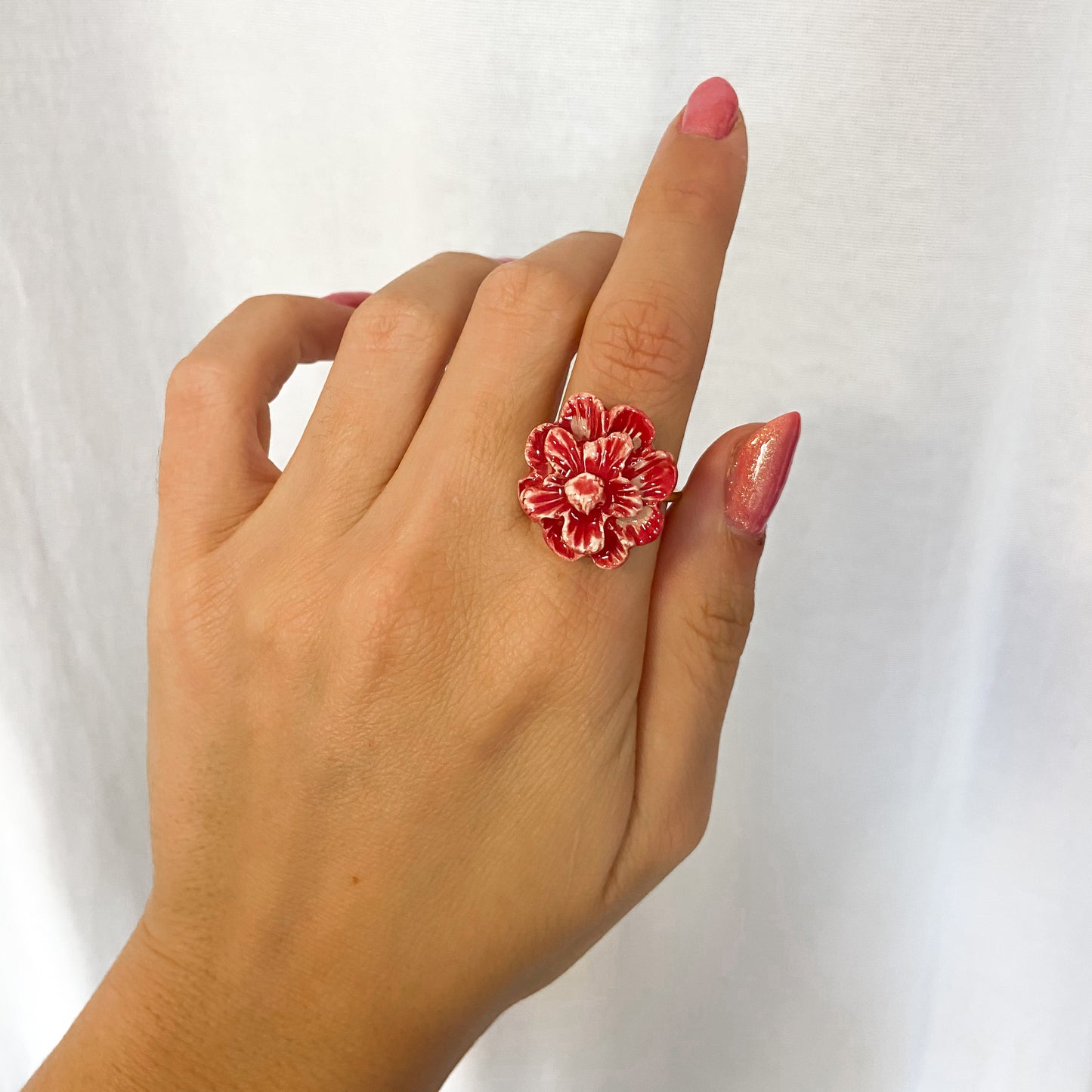 Anillo flor cerámica rojo