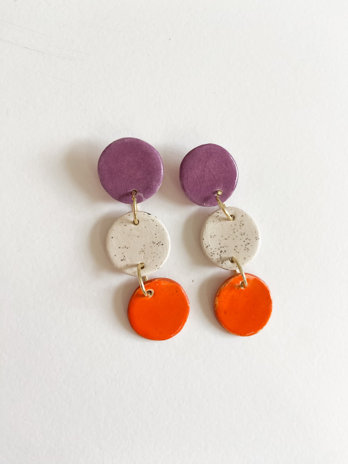 Grace cerámica morado y naranja