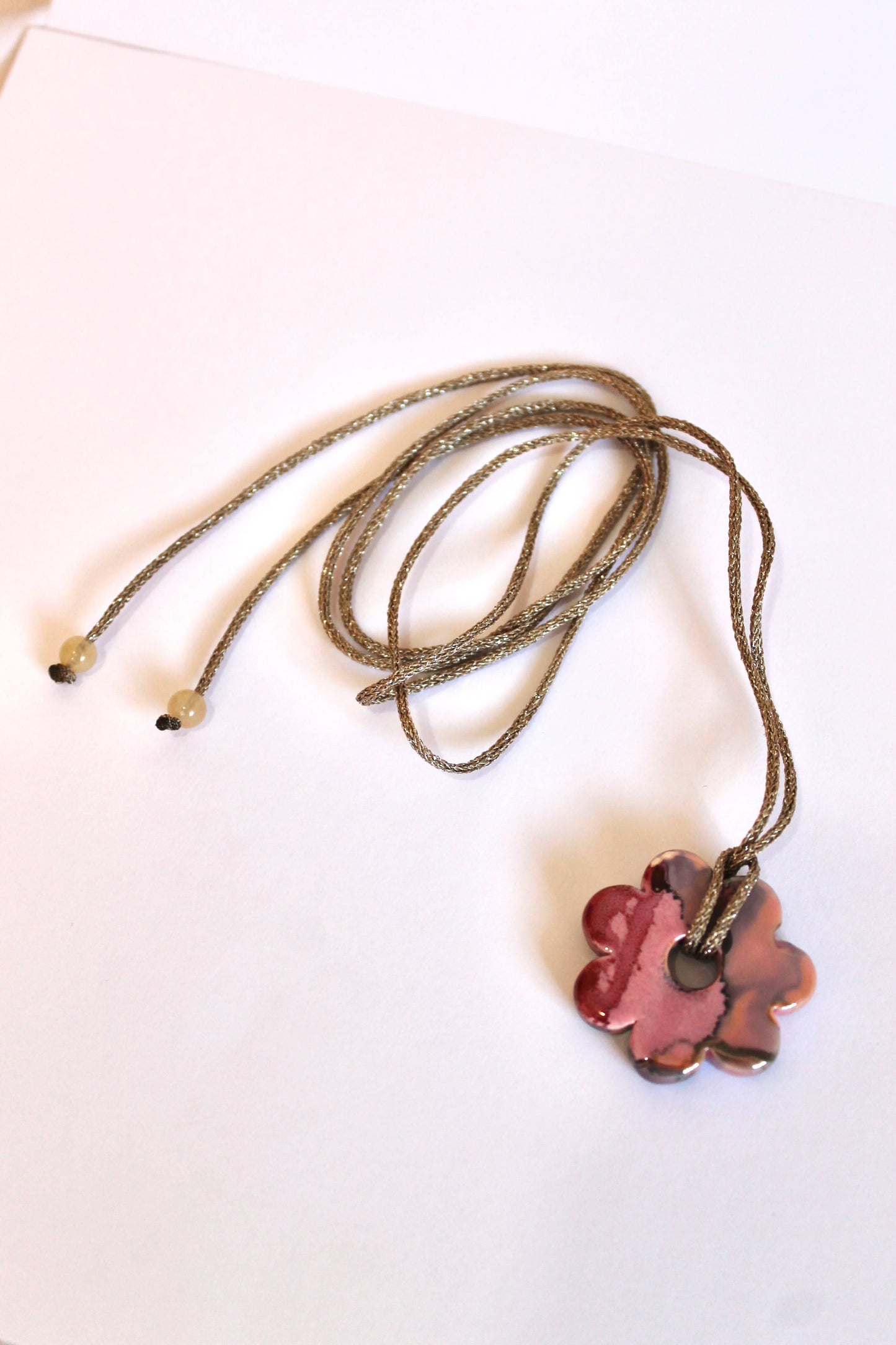 collar multiposicion rosa y negro