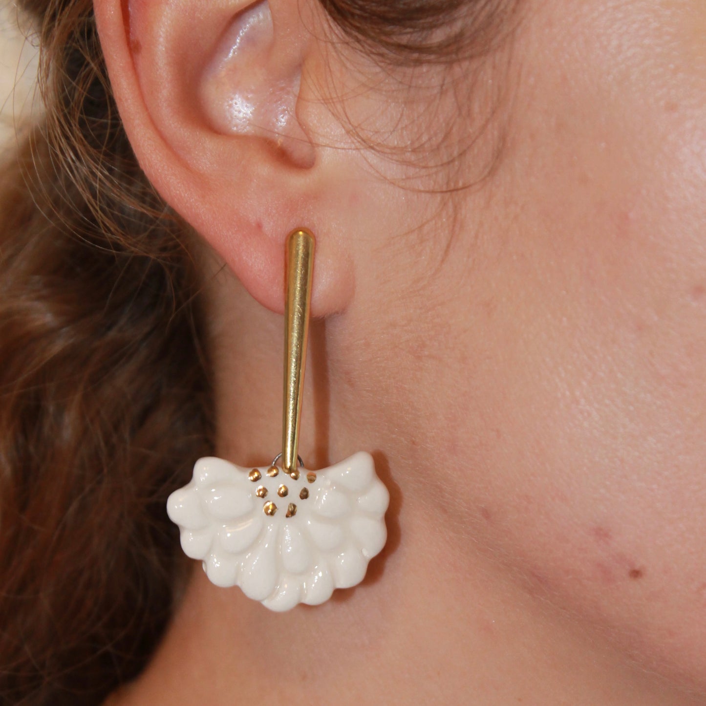 Vega blanco y dorado