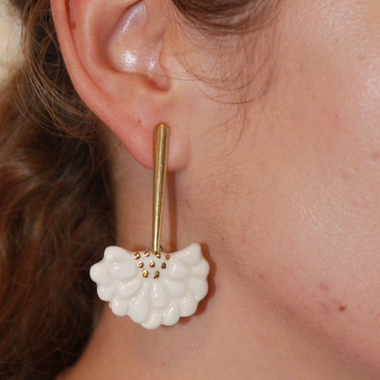 Vega blanco y dorado