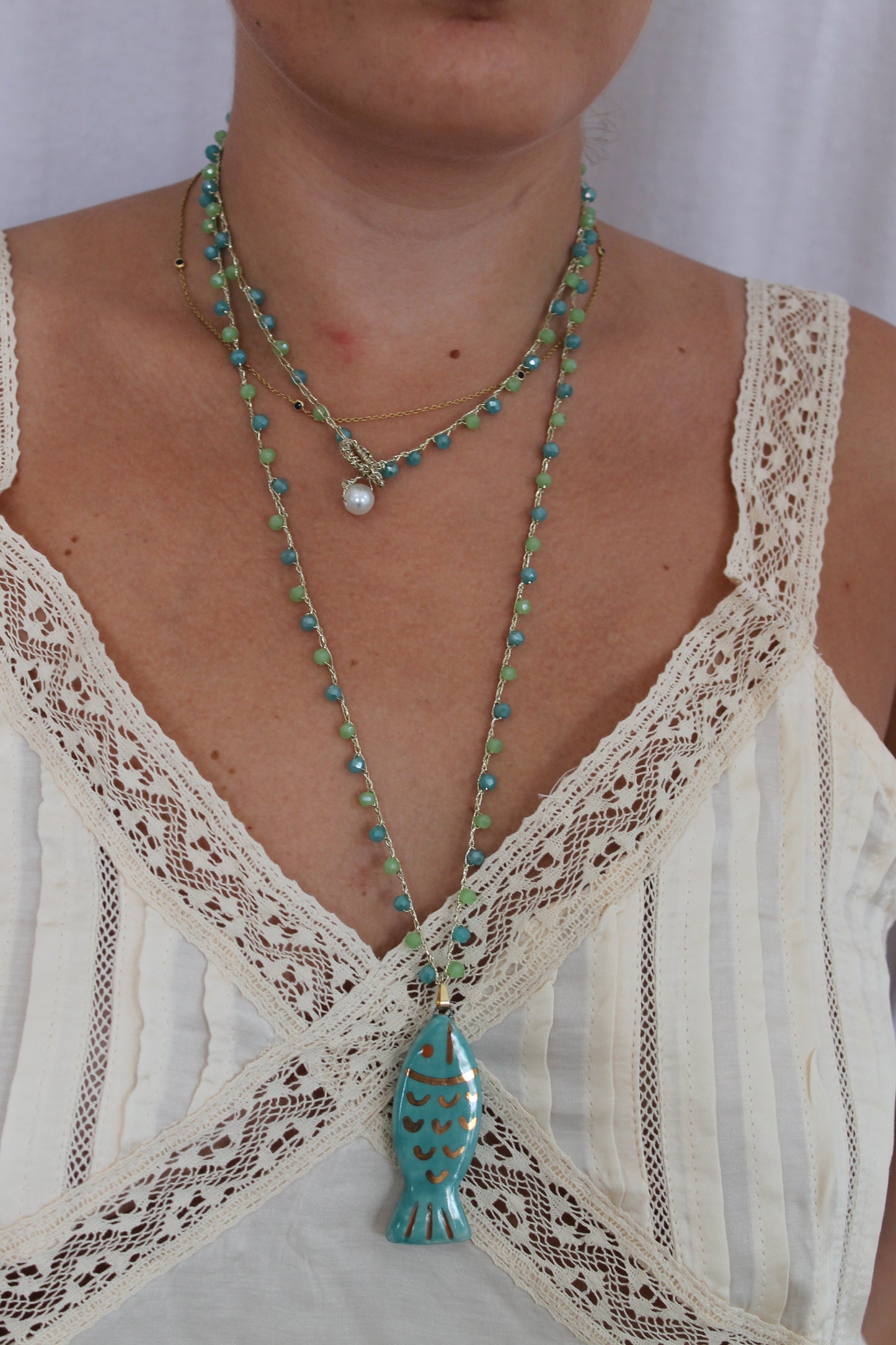 Collar pez turquesa