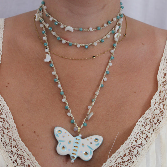 Collar mariposa turquesa