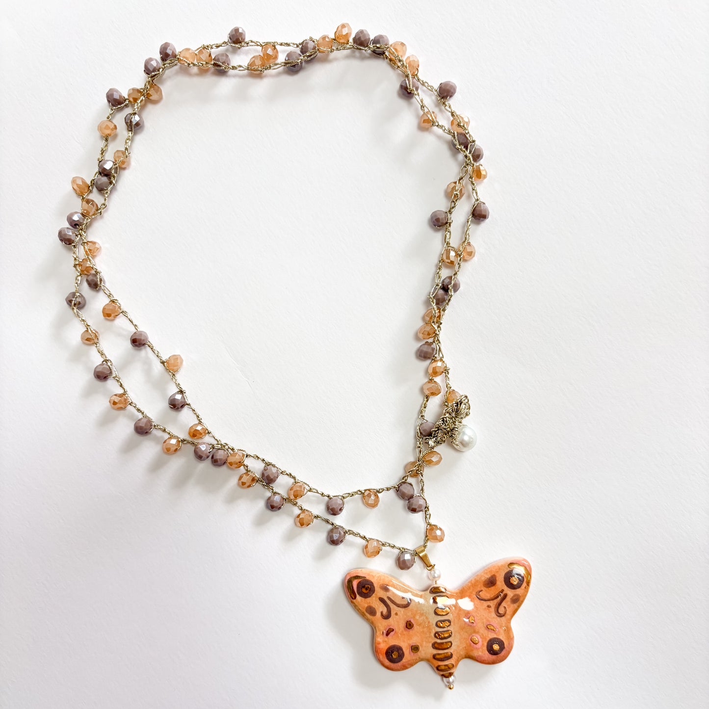 Collar mariposa marrón