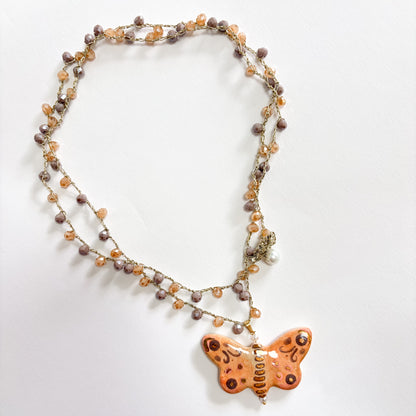 Collar mariposa marrón