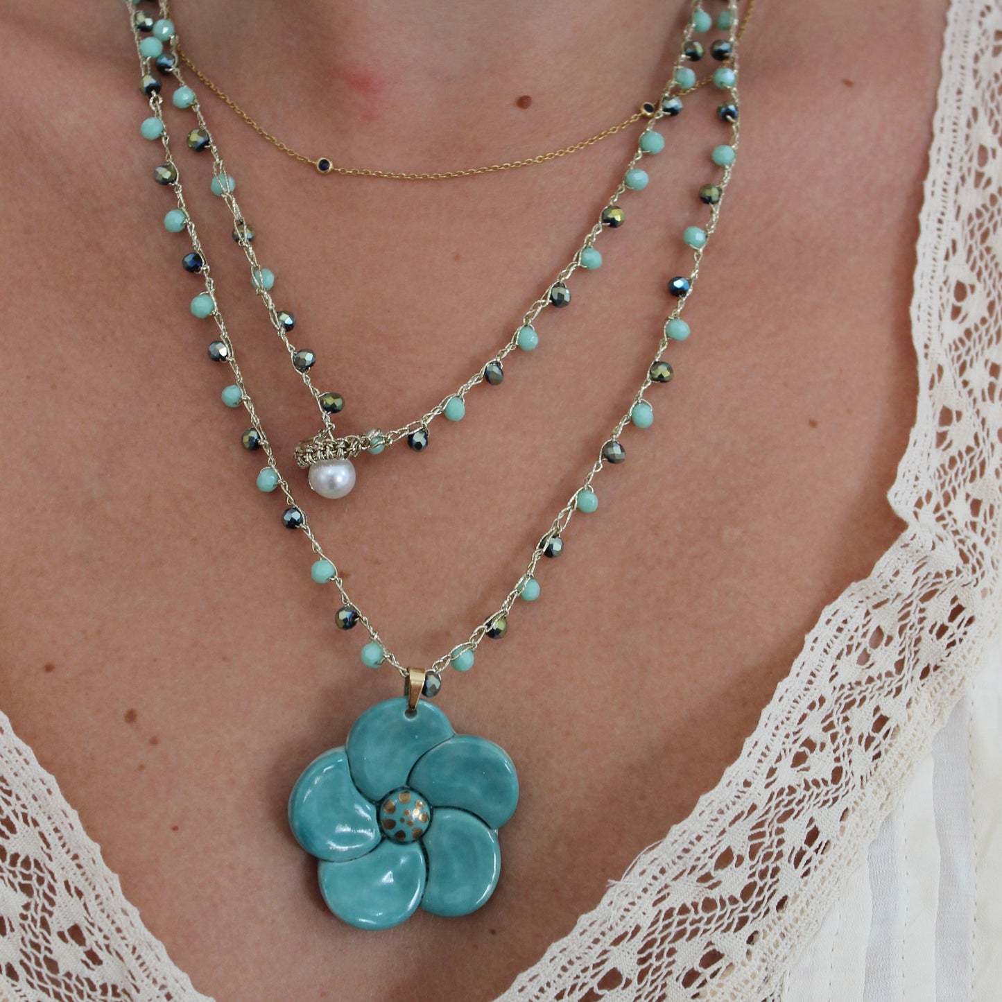 Collar flor turquesa y verde