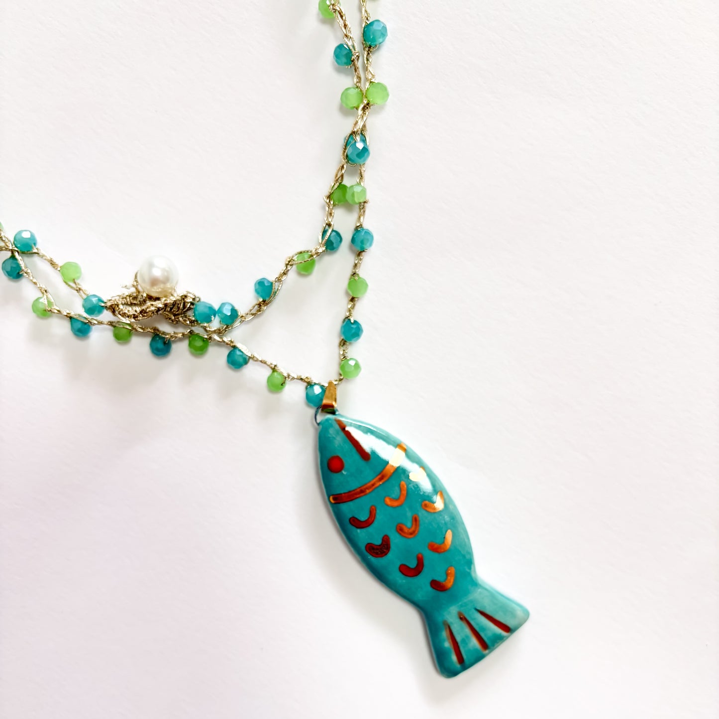 Collar pez turquesa